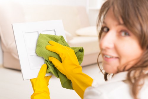 Customer and cleaner discussing a service concern calmly